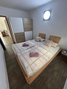 Postel nebo postele na pokoji v ubytování Apartment Marija