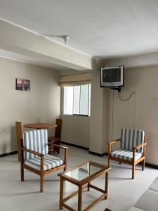 Area tempat duduk di Chanos Apart-Hotel