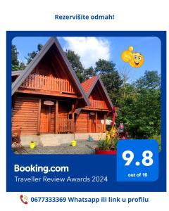 a screenshot of a website of a log cabin at Seoski Turizam Feniks - Vajat Ostrog in Kosjeric