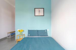 Postel nebo postele na pokoji v ubytování Kim Little Hotel Dalat