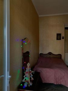 Voodi või voodid majutusasutuse Appartement in Borjomi toas