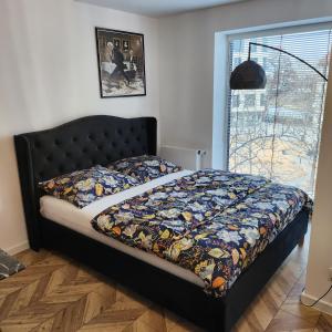 Posteľ alebo postele v izbe v ubytovaní Morfeusz Apartamenty Księcia Witolda