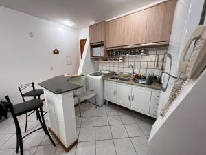 Apartamento beira mar tesisinde mutfak veya mini mutfak