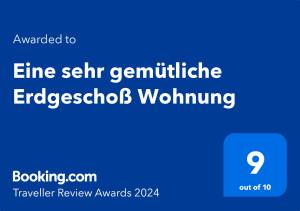 Ein Zertifikat, Auszeichnung, Logo oder anderes Dokument, das in der Unterkunft Eine sehr gemütliche Erdgeschoß Wohnung ausgestellt ist