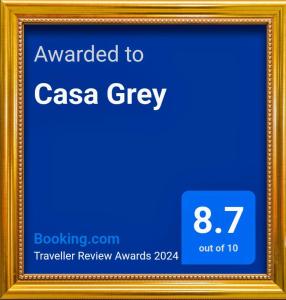 a picture frame with a sign that says awarded to casa grey at Casa Grey in Cambara do Sul