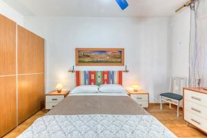 Postel nebo postele na pokoji v ubytování Appartamento fronte mare con vista mare