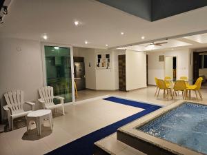 Posezení v ubytování Resort Playa Azul Departamentos