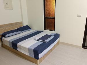 Krevet ili kreveti u jedinici u okviru objekta 南州民宿 NanChou Guesthouse