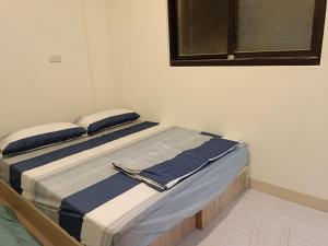 Krevet ili kreveti u jedinici u okviru objekta 南州民宿 NanChou Guesthouse