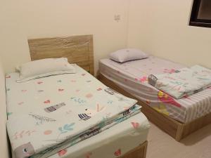 Krevet ili kreveti u jedinici u okviru objekta 南州民宿 NanChou Guesthouse