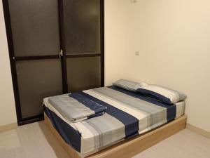 Krevet ili kreveti u jedinici u okviru objekta 南州民宿 NanChou Guesthouse