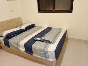 Krevet ili kreveti u jedinici u okviru objekta 南州民宿 NanChou Guesthouse