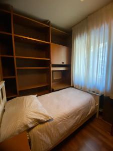 Una cama o camas en una habitación de Mountain Apartments Tarvisio