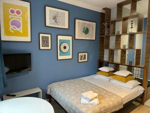 Posteľ alebo postele v izbe v ubytovaní VULTOR Apartments