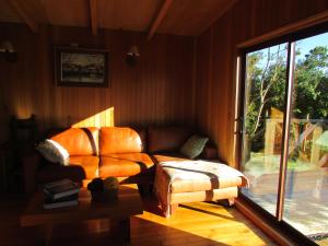 Cama o camas de una habitación en Lodge Cumbres de Chiloe