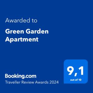 サラエボにあるGreen Garden Apartmentの青いスクリーン(緑の庭園のアパートメントに授与された文字あり)
