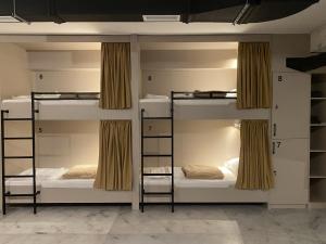 Postel nebo postele na pokoji v ubytování Dorm Kutaisi