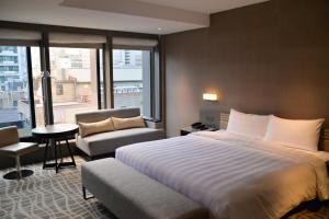 Postel nebo postele na pokoji v ubytování Hotel Midtown Richardson + 37 fotografií