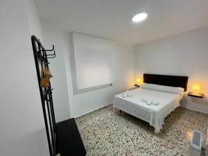 Posteľ alebo postele v izbe v ubytovaní Apartamento Balcón del Tajo