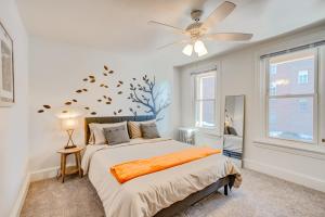 a bedroom with a bed and a ceiling fan at Charming Pottstown Apartment - Walk to Town! in Pottstown