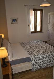 Katil atau katil-katil dalam bilik di Dommu Livia