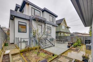 a house with a deck and a patio at Villa Z in Vancouver