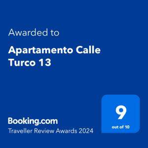 Um certificado, prêmio, placa ou outro documento exibido em Apartamento Calle Turco 13