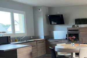 Kuchyň nebo kuchyňský kout v ubytování Accès direct plage 100m + 11 fotografií