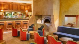 Coin salon dans l'établissement Hotel Les Hautes Roches