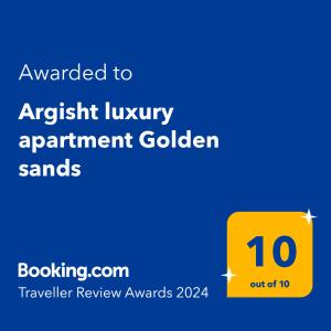 a yellow sign with the text awarded to austritiny apartment garden stands at Argisht luxury apartment Golden sands in Golden Sands