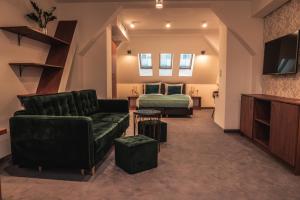 TV a/nebo společenská místnost v ubytování Brassel Aparthotel