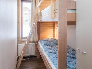 En eller flere senge i et værelse på Holiday Home Länsirinne b5 by Interhome