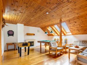 a living room with a ping pong table at Holiday Home Malovidy by Interhome in Rataje nad Sázavou