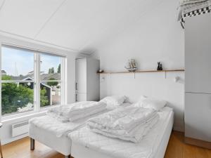 Voodi või voodid majutusasutuse Apartment Sebiorn - 5m from the sea in Djursland and Mols by Interhome toas