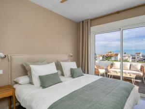 Postel nebo postele na pokoji v ubytování Apartment Ático Los Pelicanos by Interhome