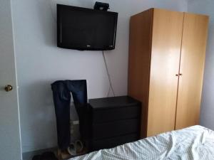 Et tv og/eller underholdning på Appartement bord de mer-Aguilas