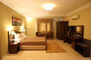 Postel nebo postele na pokoji v ubytování Hotel Mauricenter Nouakchott