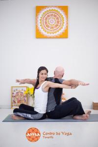 a man and a woman sitting on a yoga pose at Hotel Nautico in Santa Cruz de Tenerife