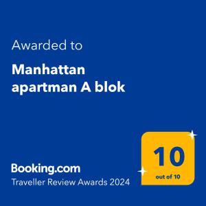 a yellow box with the text awarded to manhattan apartmentarian a block at Manhattan apartman A blok in Novi Beograd