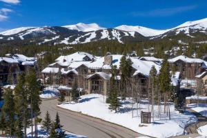 an aerial view of a resort with snow covered mountains at Grand Timber Lodge 3 bedroom - Ski-in/Ski-out in Breckenridge