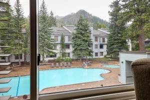 a view of a pool from a window at Studio #234 in Olympic Valley