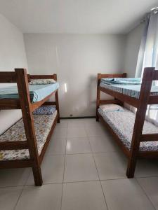 Двох'ярусне ліжко або двоярусні ліжка в номері Villa das Águas - Praia do Saco