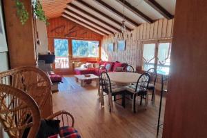 Oleskelutila majoituspaikassa Appartement, vue sur le lac