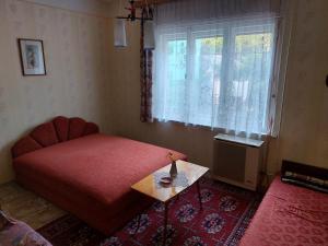 Posteľ alebo postele v izbe v ubytovaní Holiday House Retro