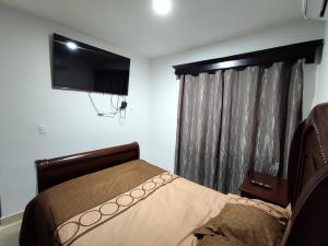 Bonita casa en Mazatlán 객실 침대