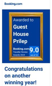 a sign that says awarded to a guest housepler at Guest House Prilep in Prilep