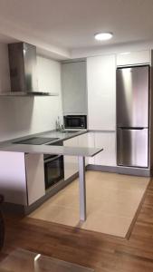 Dapur atau dapur kecil di APARTAMENTO MOAÑA - PLAYA A XUNQUEIRA +11 gambar