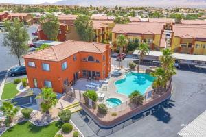 an aerial view of a house with a swimming pool at Hawk Ridge Two Bedroom Condo by Cool Properties in Mesquite