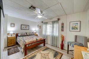 a bedroom with a bed and a ceiling fan at Pet-Friendly Camp Verde Home Hiking, Wine and More! in Camp Verde