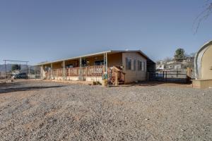 a large house with a yard in front of it at Pet-Friendly Camp Verde Home Hiking, Wine and More! in Camp Verde